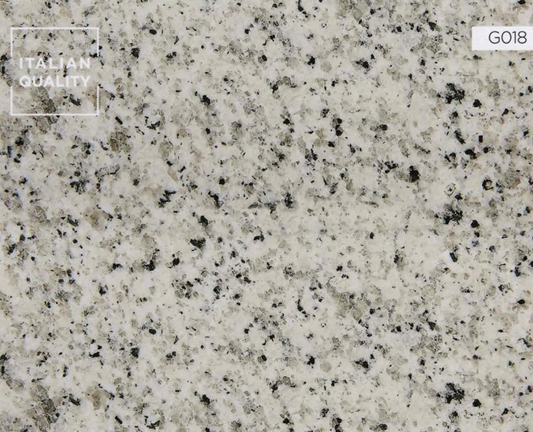 G018_Bianco-Kristall_Granite Der Bianco Cristal Granit ist ein harter Naturstein der durch seinen weiß- hellgrauen Grundton mit grauer Punktierung besticht. Bianco Cristal hat eine kühle elegante, aber ruhige Ausstrahlung und überzeugt durch seine eher einheitliche Maserung.