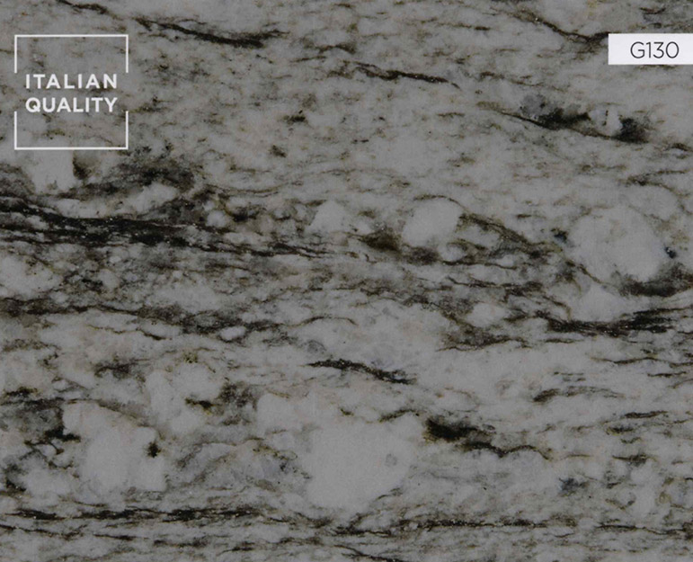 G130_Blue-Dunes_Granite Der Blue Dunes Granit ist eine erdfarbene Schönheit mit verschiedenen Creme-, Grau- und Schwarztönen. Wenn Sie genau hinsehen, werden Sie blaue Flecken erkennen, die diesem Stein seinen Namen geben. Dieser atemberaubende Naturstein wird in den Steinbrüchen Brasiliens abgebaut.
